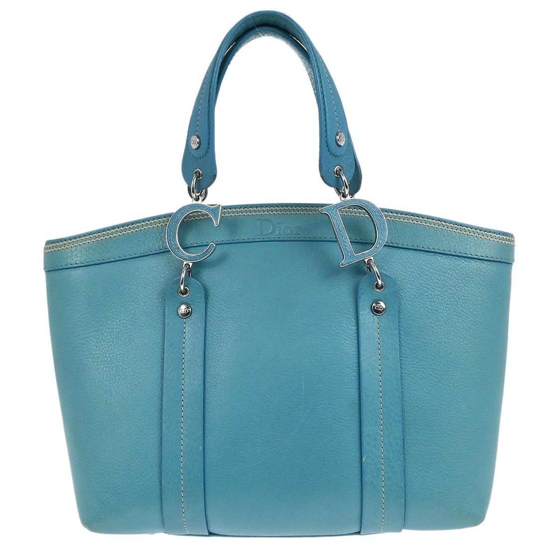 Turquoise Blue Leather Medium Handbag by Christian Dior Model 07-BO-1005: Turquoise Blue Leather Medium Handbag by Christian Dior Model 07-BO-1005 This Christian Dior turquoise blue leather handbag features a medium-sized design with a magnetic closure. The bag is crafted f