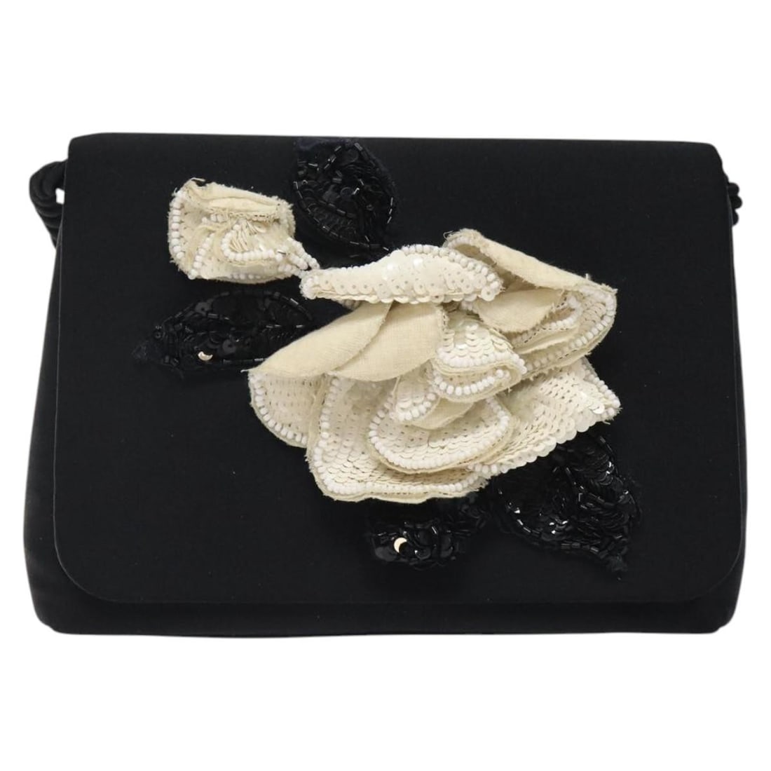 Chanel Silk Camellia Black Clutch Bag 17cm by 13cm by 6cm: Chanel Silk Camellia Black Clutch Bag 17cm by 13cm by 6cm This Chanel Camellia clutch bag is crafted from black silk, designed for female use. It features a shoulder strap and metal fittings, exhibiti