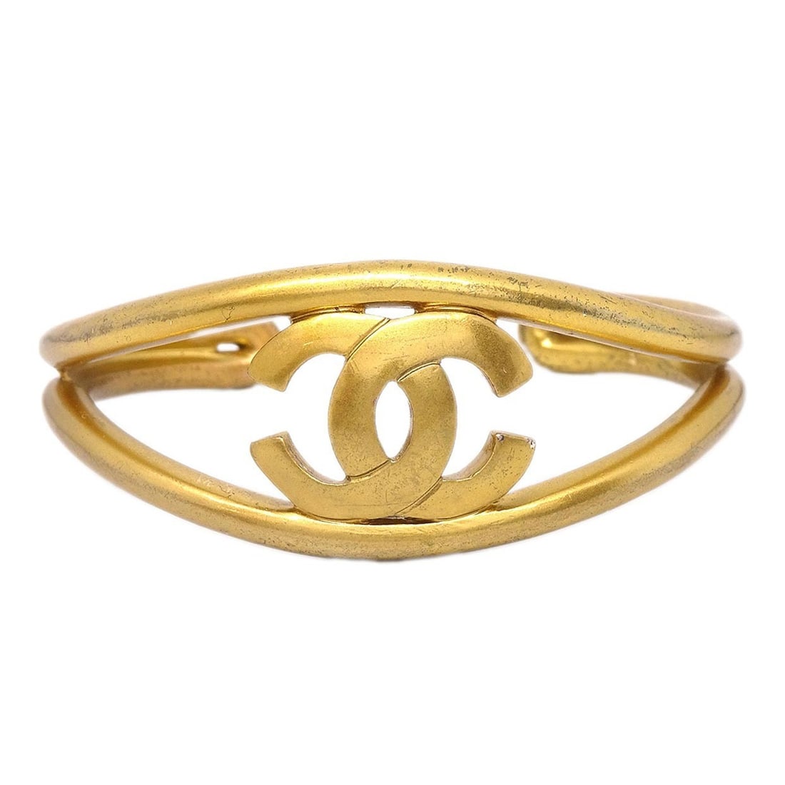Chanel 97P Gold Plated Bangle Bracelet Accessory: Chanel 97P Gold Plated Bangle Bracelet Accessory This Chanel gold-plated bangle bracelet features a classic design and is finished in an elegant gold tone. Made in France, it offers a sophisticated ac
