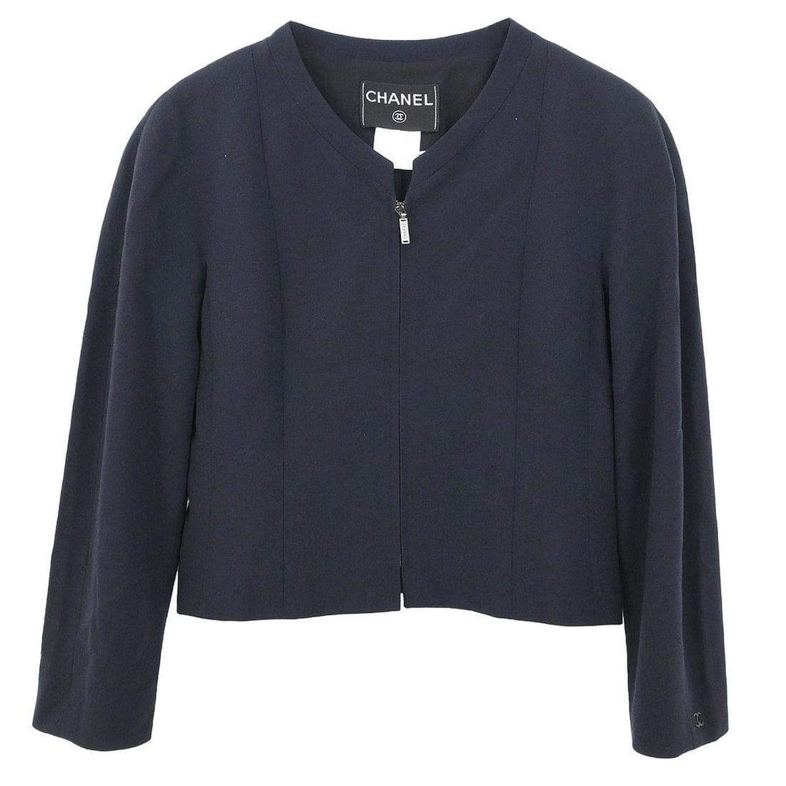 Chanel Navy Wool Single Breasted Zip Jacket Size 38 Vintage 99P: Chanel Navy Wool Single Breasted Zip Jacket Size 38 Vintage 99P This vintage Chanel single-breasted zip-up jacket features a mid-length silhouette in navy blue. Crafted from 100% wool with a silk lini