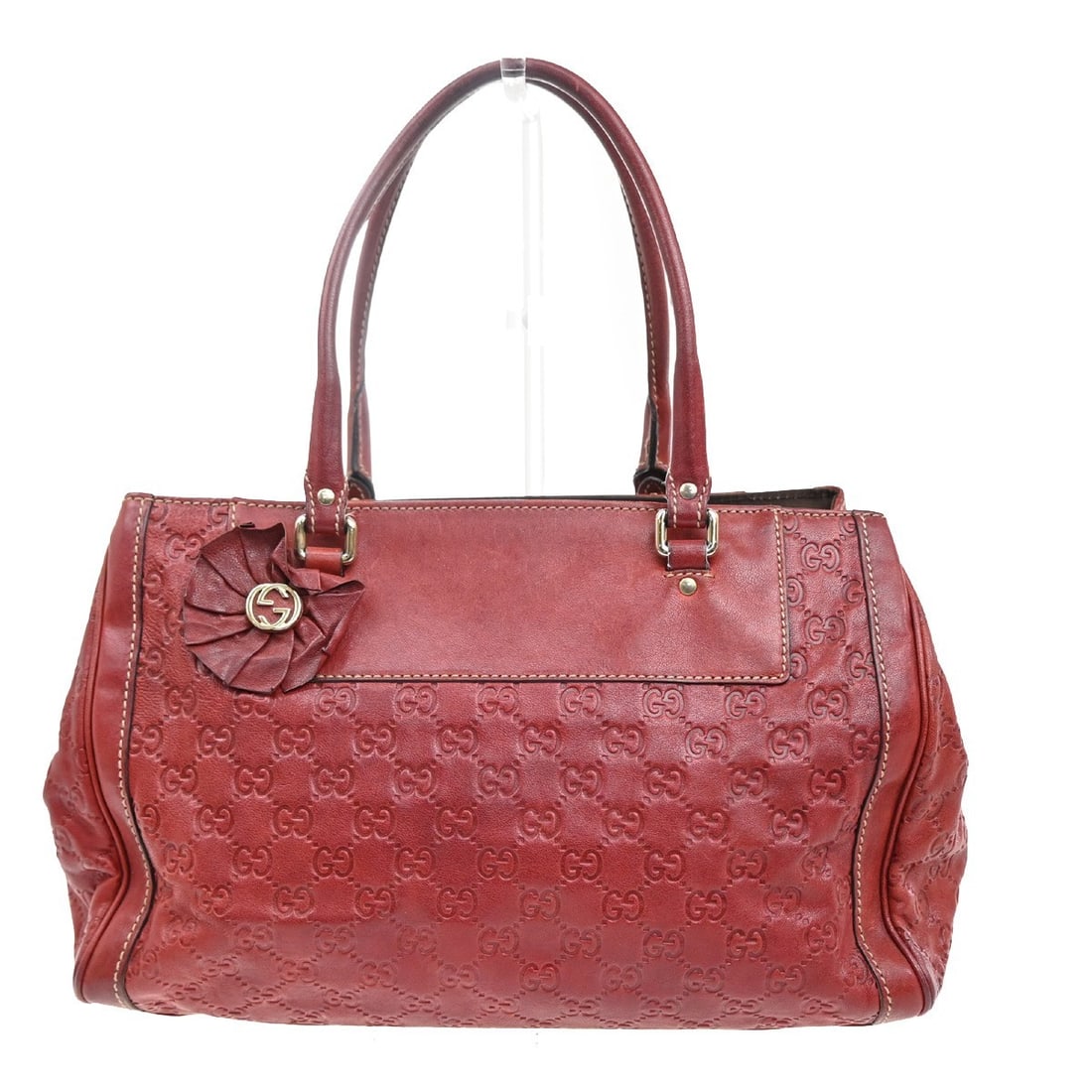 Red Leather Gucci Vintage Handbag 35cm by 21cm by 14cm: Red Leather Gucci Vintage Handbag 35cm by 21cm by 14cm This vintage Gucci handbag for women features red leather construction with signs of wear including scuffs, dirt, wrinkles, stains, scratches, pe