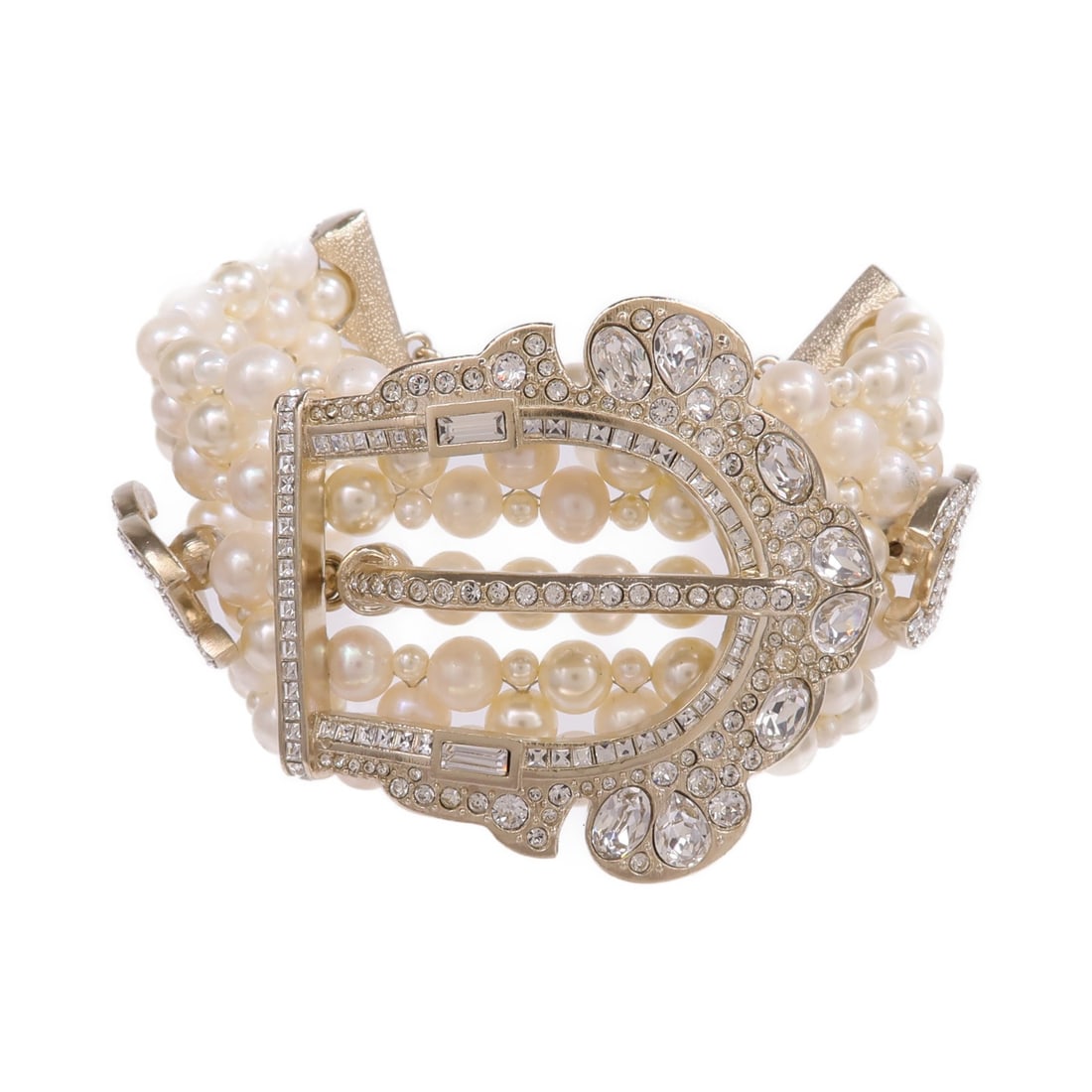 CHANEL Gold Tone Bracelet with CC Logo and White Crystal Accents: CHANEL Gold Tone Bracelet with CC Logo and White Crystal Accents This CHANEL CC bracelet features a gold-tone metal design with the iconic CC logo, adorned with crystal accents. Expertly crafted in Fr