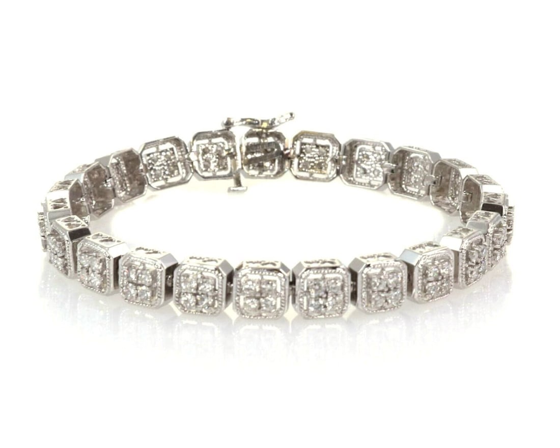 Vintage Cushion Link Bracelet in 14k White Gold with Diamonds and Milgrain Detail: Vintage Cushion Link Bracelet in 14k White Gold with Diamonds and Milgrain Detail This vintage bracelet features a cushion link design crafted in 14k white gold, accented with milgrain detailing for a