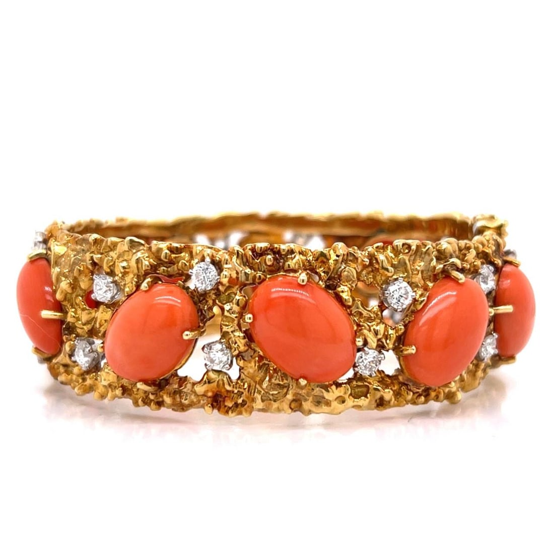1960s 18K Yellow Gold Coral Diamond Bangle Bracelet 22 Stones: 1960s 18K Yellow Gold Coral Diamond Bangle Bracelet 22 Stones This stunning 1960's bangle bracelet features an exquisite design crafted from 18K yellow gold, adorned with vibrant coral and sparkling d