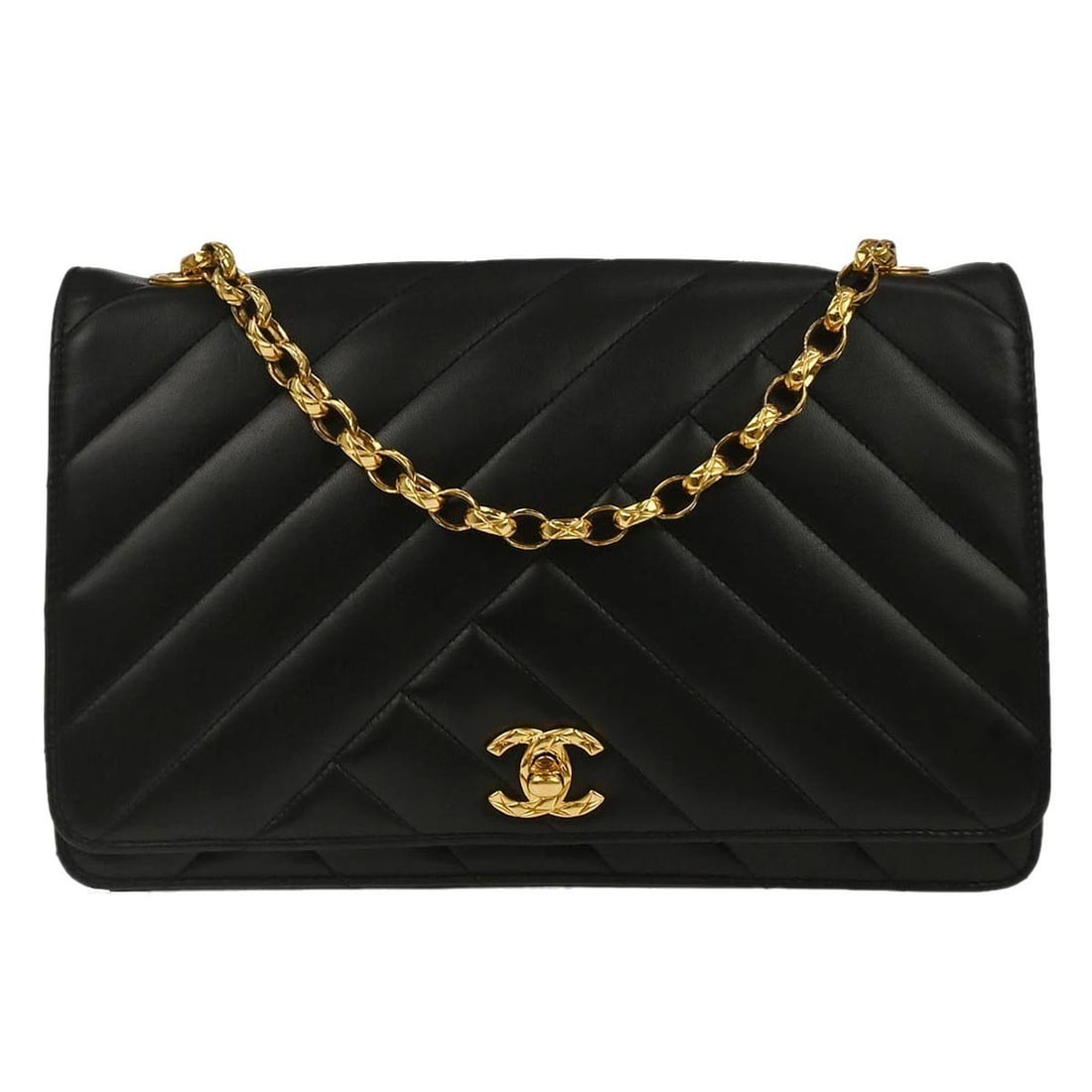 Black Lambskin Medium Shoulder Bag by Chanel with Turn Lock: Black Lambskin Medium Shoulder Bag by Chanel with Turn Lock This Chanel shoulder bag features black lambskin leather with bias stitch detailing and a turn lock closure. Designed in a medium size, it i