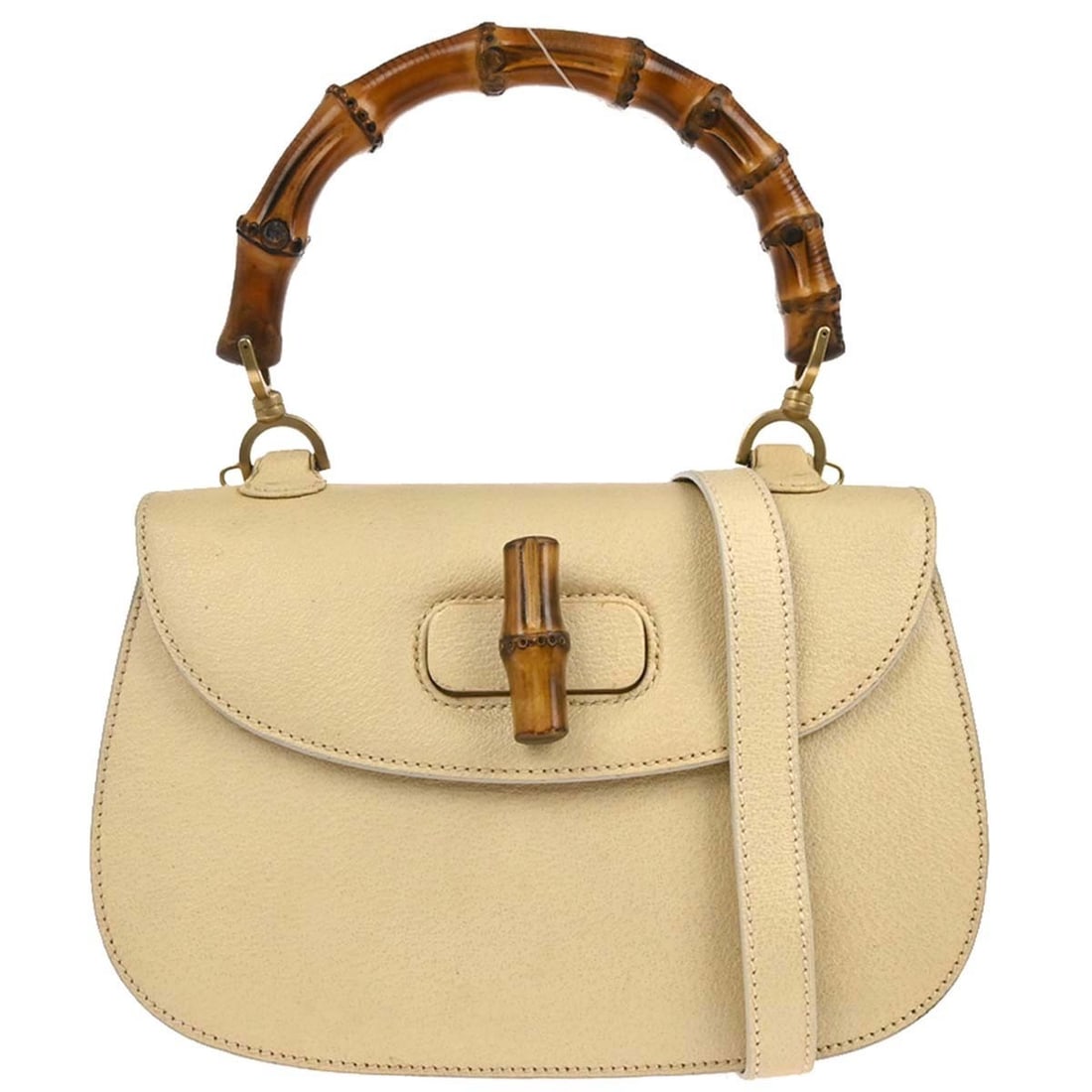 Beige Leather Bamboo Accent Gucci Medium Two Way Top Handle Bag: Beige Leather Bamboo Accent Gucci Medium Two Way Top Handle Bag This Gucci Bamboo 2-way handbag features light beige pigskin leather with brown top handles and distinctive bamboo accents. The medium-s