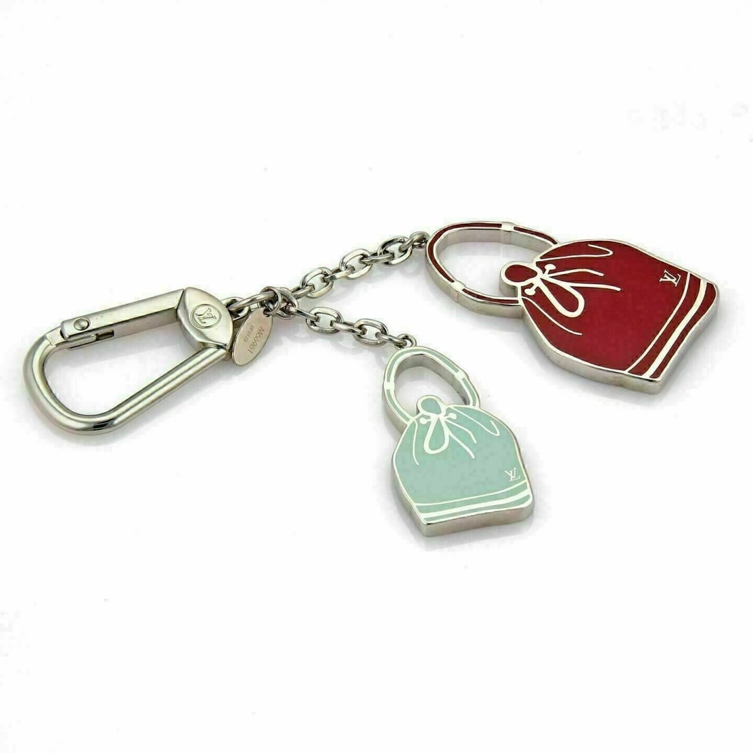 Louis Vuitton Noe Red Green Enamel Handbag Keyring Charm Accessory: Louis Vuitton Noe Red Green Enamel Handbag Keyring Charm Accessory This Louis Vuitton Noe bag charm and keychain holder is crafted from red and green enamel with silver metal accents. Featuring distin