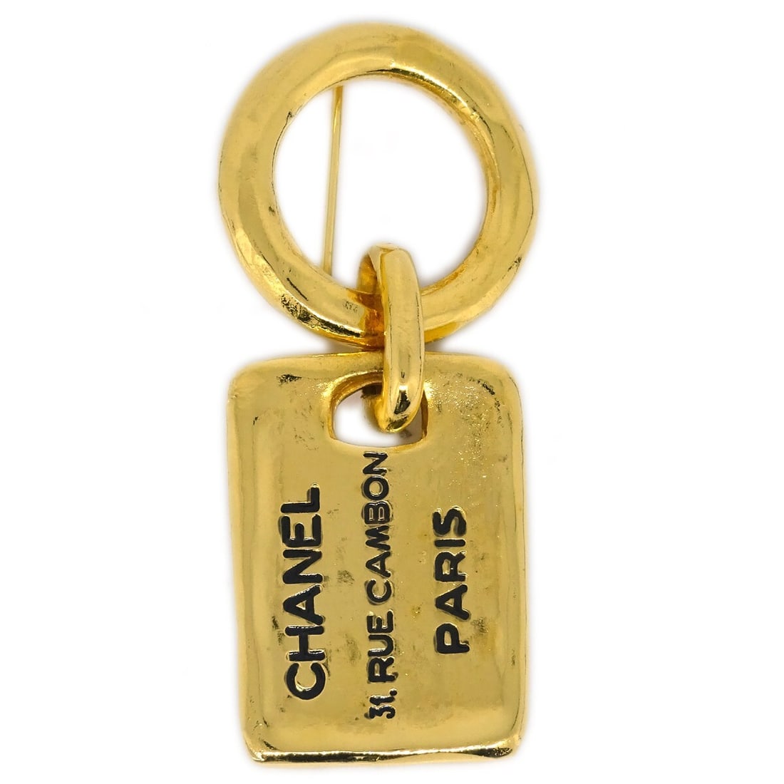 Chanel Gold-Plated Brooch Pin 1133: Chanel Gold-Plated Brooch Pin 1133 This exquisite Chanel brooch pin is a stunning accessory crafted in a luxurious gold-plated finish. The brooch showcases a sophisticated design that embodies the ele