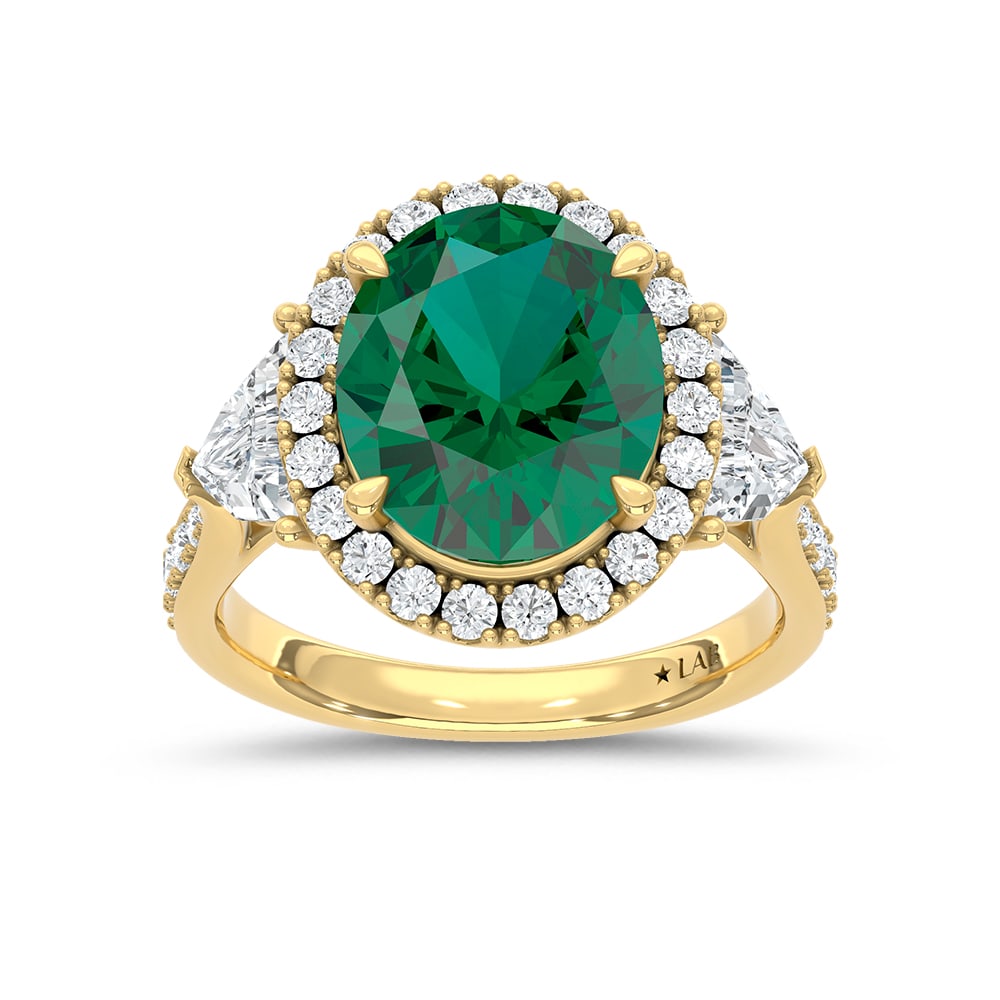 14K Yellow Gold Lab Grown Diamond 6 7/8 Ct.Tw. Oval Shape Recrystalized Emerald Engagement Ring: 14K Yellow Gold Lab Grown Diamond 6 7/8 Ct.Tw. Oval Shape Recrystalized Emerald Engagement Ring (Center 5 ct) Make a statement of timeless elegance with this 14K yellow gold engagement ring. Its cente