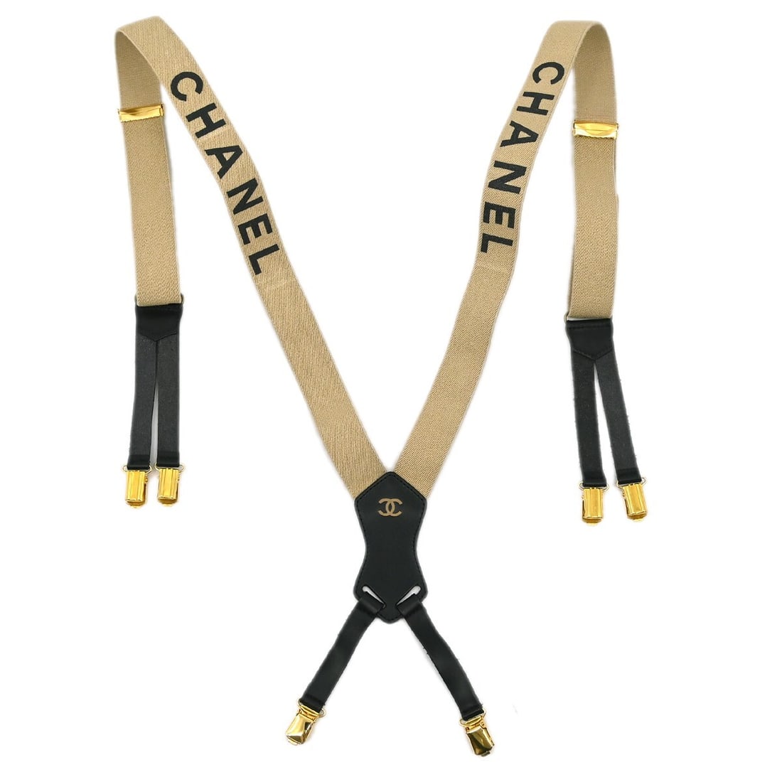 Chanel Beige Leather Suspenders with Metal Theme: Chanel Beige Leather Suspenders with Metal Theme Elevate your outfit with these stylish Chanel suspenders in a chic beige color. Crafted from high-quality leather, these suspenders feature a metal the
