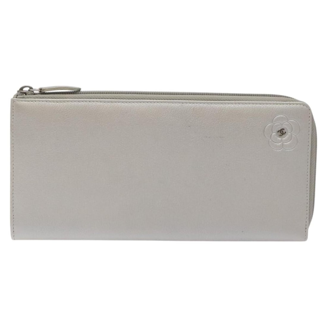 Leather Zip Around Organizer by Chanel Camellia in Silver: Leather Zip Around Organizer by Chanel Camellia in Silver This Chanel Camellia Zip Around Organizer is crafted from leather and features a silver color. Designed for women, it is made in Italy and off