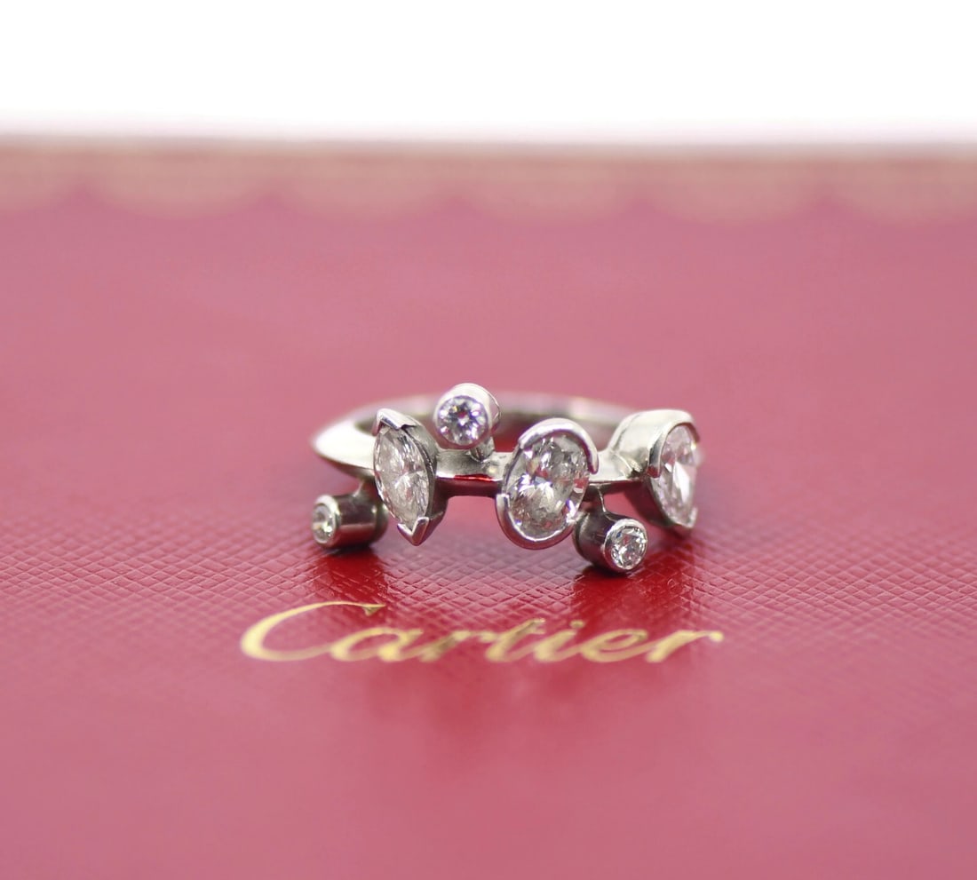 Cartier Meli Melo Diamond Platinum Ring 5.5 Authentic with Box: Cartier Meli Melo Diamond Platinum Ring 5.5 Authentic with Box Experience elegance with this exquisite Cartier Meli Melo Diamond Platinum Ring. Crafted with a stunning diamond set in luxurious 950 pla