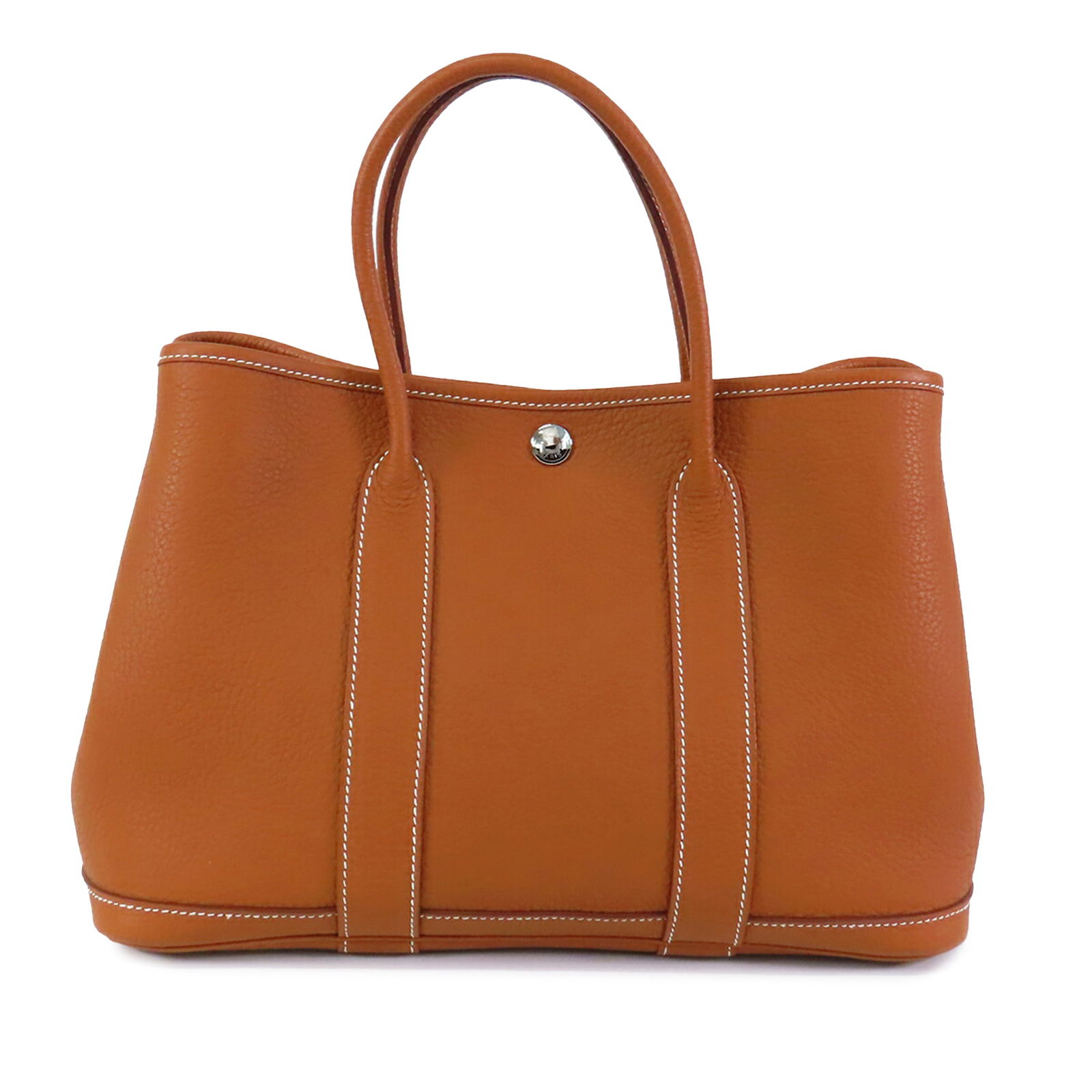 Gold Negonda Leather Garden Party 30 Tote by Hermes with Snap Closure: Gold Negonda Leather Garden Party 30 Tote by Hermes with Snap Closure This Hermes Garden Party 30 is crafted from Negonda leather in a Gold color and features rolled leather top handles, an open top w