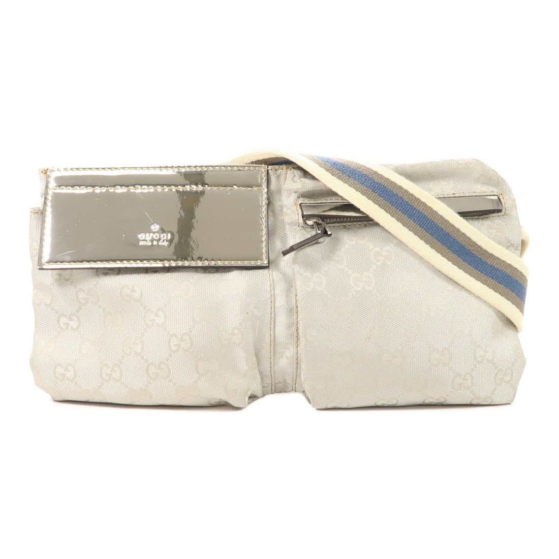 Gucci GG Canvas Silver Waist Bag Model 28566: Gucci GG Canvas Silver Waist Bag Model 28566 This Gucci GG waist bag features a silver GG canvas exterior and is designed for versatile use as a waist or body bag. Made in Italy, it offers a stylish a