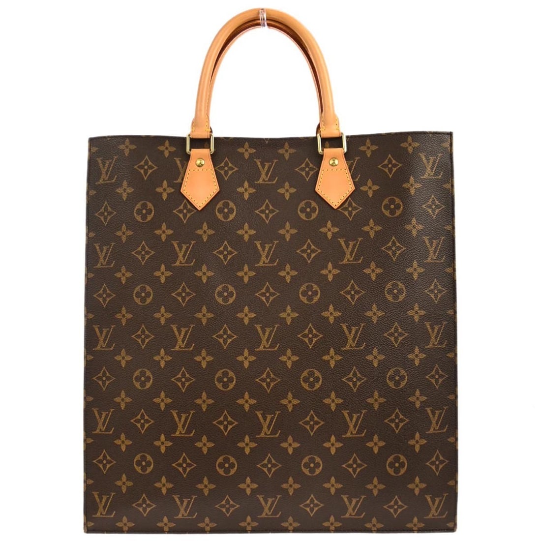 Monogram Canvas Sac Plat Tote by Louis Vuitton M51140 Brown Medium: Monogram Canvas Sac Plat Tote by Louis Vuitton M51140 Brown Medium This Louis Vuitton Sac Plat tote handbag features the iconic monogram canvas with leather trim and handles. Designed with a medium si