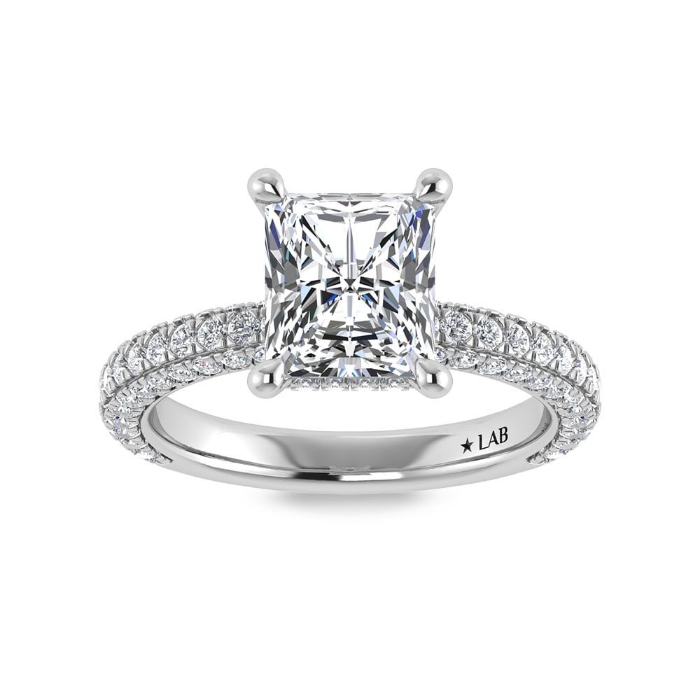 14K White Gold Lab Grown Diamond 4 Ct.Tw. Radiant Shape Halo Engagement Ring (IGI Certified Center: 14K White Gold Lab Grown Diamond 4 Ct.Tw. Radiant Shape Halo Engagement Ring (IGI Certified Center 3ct) Discover subtle brilliance and modern elegance with our Hidden Halo Diamond Engagement Ring. Thi