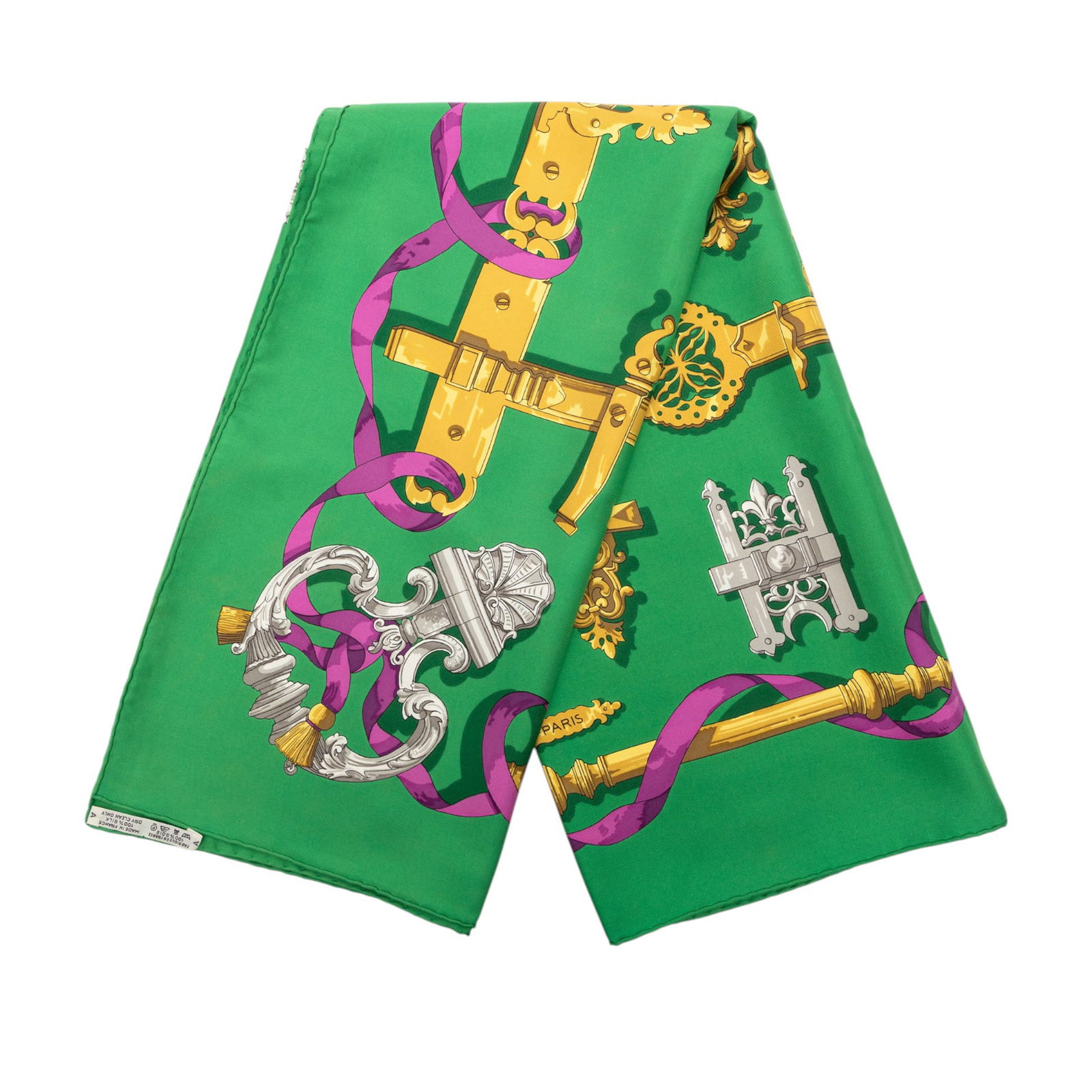 Ferronnerie Green Silk Scarf by Hermes 90cm: Ferronnerie Green Silk Scarf by Hermes 90cm This Hermes Ferronnerie Silk Scarf 90 showcases the iconic Ferronnerie print in green on 100% silk. Crafted in France, it is a stylish accessory with a luxu