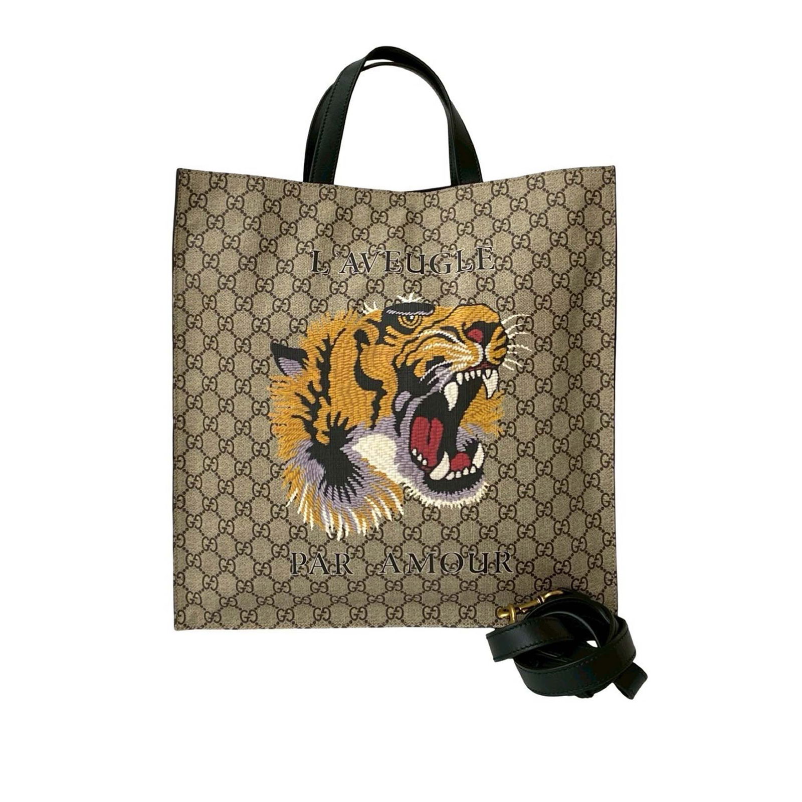 Convertible Tote Bag Gucci GG Supreme LAveugle Par Amour Canvas Brown: Convertible Tote Bag Gucci GG Supreme LAveugle Par Amour Canvas Brown This Gucci GG Supreme LAveugle Par Amour Tote features a coated canvas body with flat leather handles and a detachable flat leathe