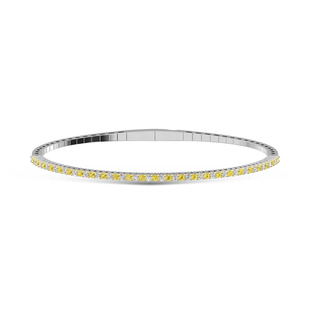 14K White Gold 1 Ct.Tw. Alternate white and Yellow Lab Grown Diamond Bangle: 14K White Gold 1 Ct.Tw. Alternate white and Yellow Lab Grown Diamond Bangle This 14K White Gold bangle features alternate white and yellow lab grown diamonds totaling 1 Ct.Tw., offering luminous elega