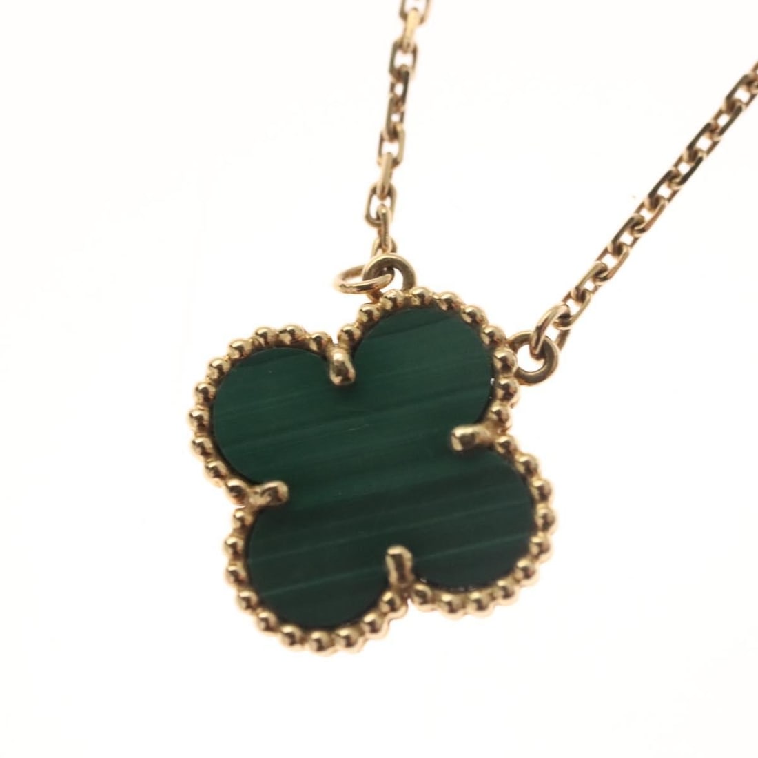 Van Cleef & Arpels Malachite Vintage Alhambra Necklace 18K Gold Auth 131108M: Van Cleef & Arpels Malachite Vintage Alhambra Necklace 18K Gold Auth 131108M This exquisite Van Cleef & Arpels Vintage Alhambra Necklace features a stunning malachite motif, beautifully crafted in 18K