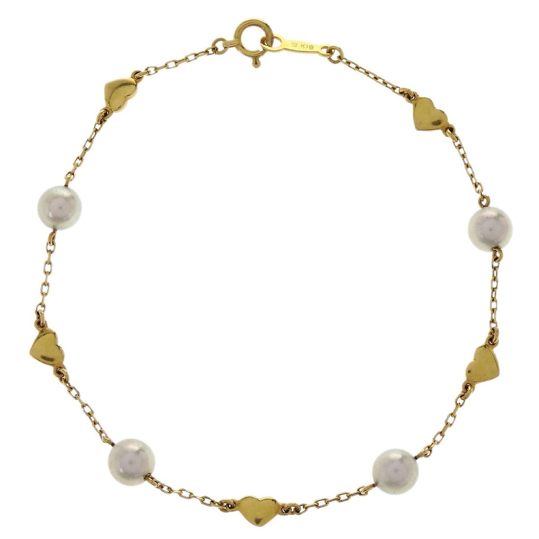 18K Gold Chain Bracelet with Pearl by Mikimoto: 18K Gold Chain Bracelet with Pearl by Mikimoto This vintage Mikimoto bracelet features a chain style crafted from 18K gold and adorned with pearls. It is in very good condition, making it a refined ad