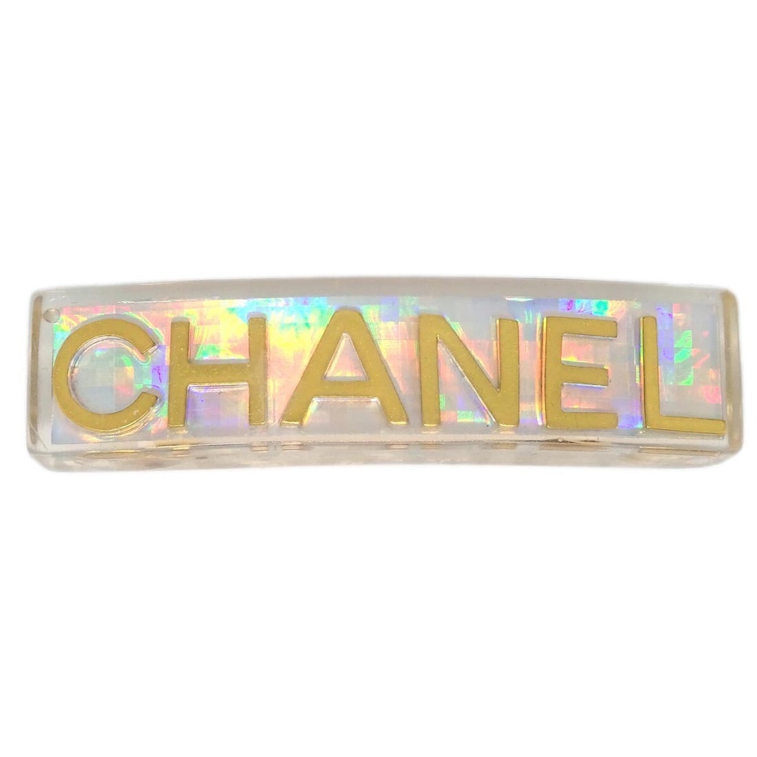 Chanel 97A Clear Gold Plated Acrylic Hair Clip Barrette: Chanel 97A Clear Gold Plated Acrylic Hair Clip Barrette Elevate your hairstyle with this stunning Chanel Hair Clip Barrette. Featuring a clear gold color, this elegant accessory is perfect for casual
