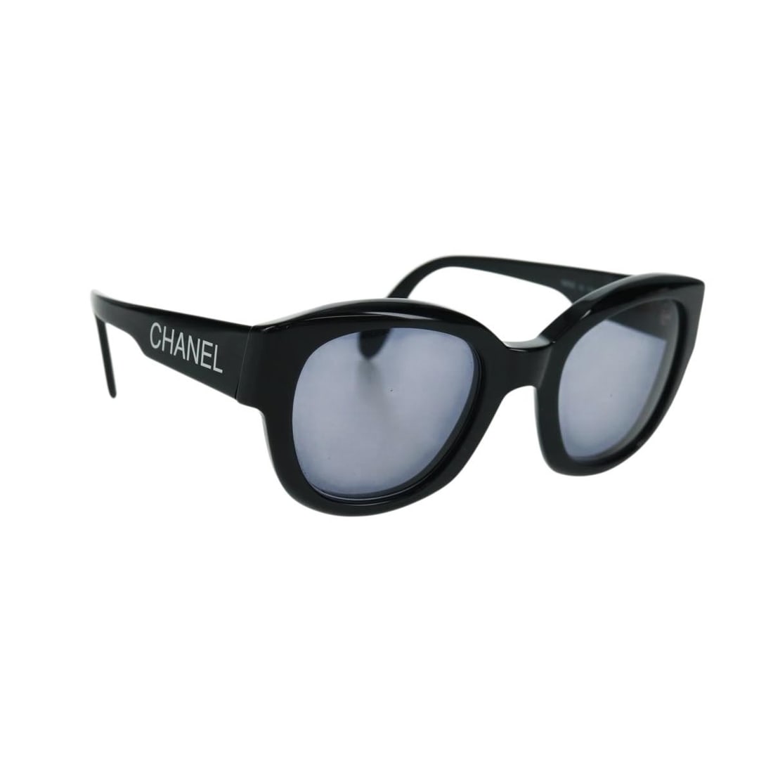 Black Plastic Sunglasses by CHANEL with Case Made in Italy: Black Plastic Sunglasses by CHANEL with Case Made in Italy These CHANEL sunglasses feature a classic black plastic frame and iconic CC branding. Made in Italy, they offer a stylish and timeless look.