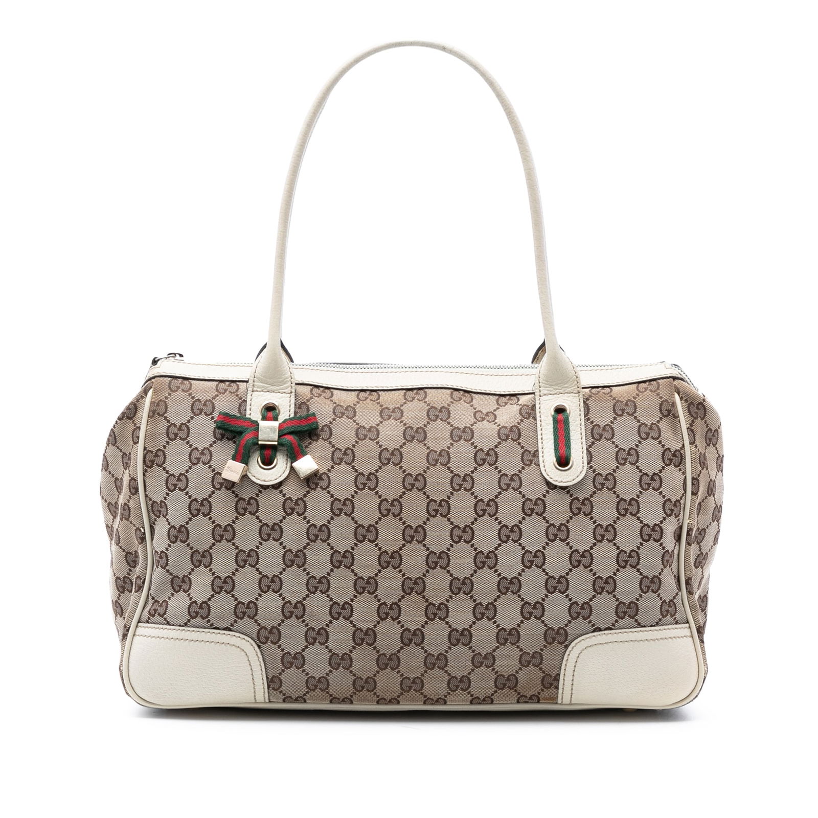 Brown Gucci Princy Shoulder Purse in GG Canvas with Leather Trim: Brown Gucci Princy Shoulder Purse in GG Canvas with Leather Trim This Gucci GG Canvas Princy Shoulder Bag features a brown canvas body with leather trim, rolled leather handles, a top zip closure, and