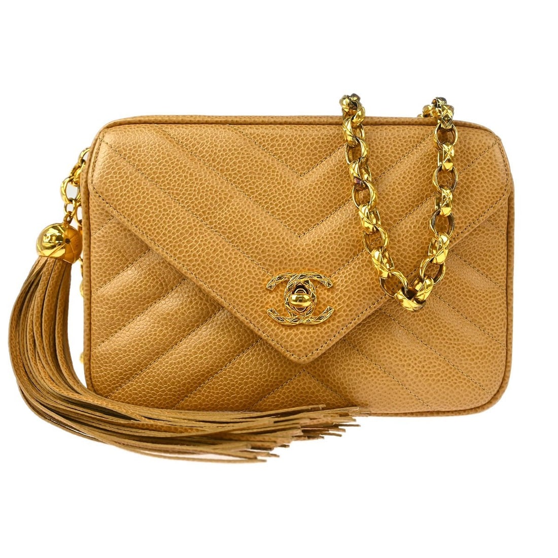 Chanel Mini Beige Caviar Leather Chevron Camera Bag with Fringe: Chanel Mini Beige Caviar Leather Chevron Camera Bag with Fringe The Chanel Beige Calfskin Chevron Camera Bag Mini is an elegant accessory ideal for casual occasions. Crafted from durable caviar skin l