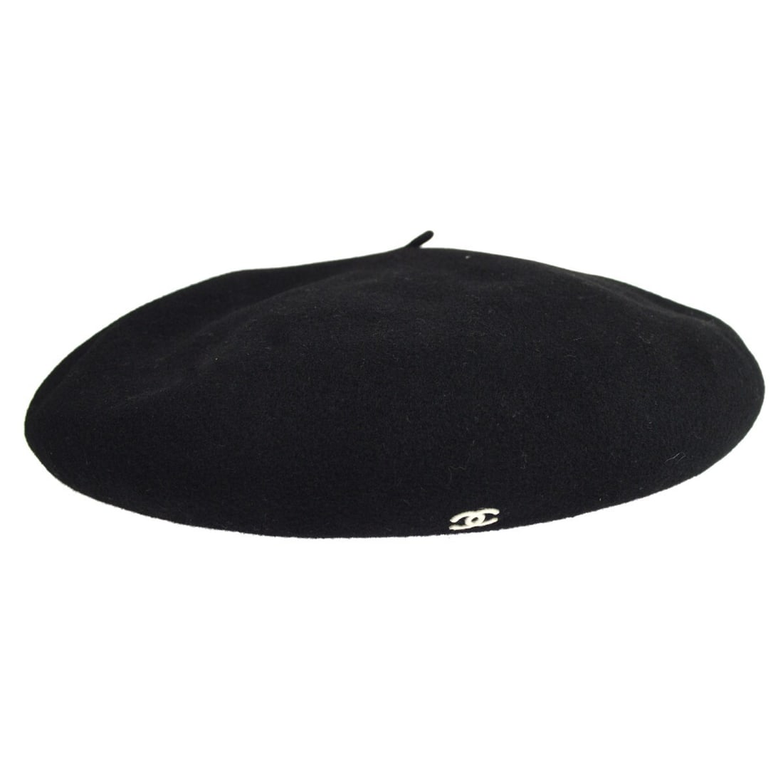 Chanel Vintage Black Wool Beret Hat 57 with Logo: Chanel Vintage Black Wool Beret Hat 57 with Logo Elevate your casual style with this vintage Chanel beret hat, expertly crafted from 100% wool. Designed for the fall and winter seasons, this beret fea