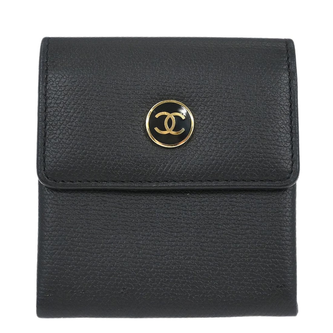 Black Calfskin Leather Wristlet Coin Wallet by Chanel: Black Calfskin Leather Wristlet Coin Wallet by Chanel This Chanel coin wallet features black leather in a wristlet style, crafted in Italy. The coin purse is in very good condition both inside and out