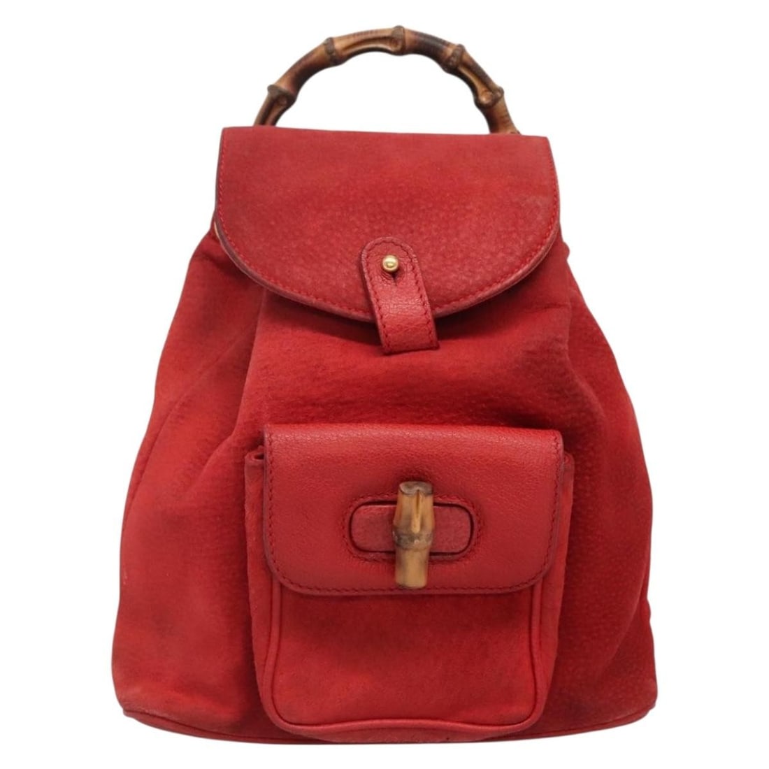 Gucci Suede Red Vintage Bamboo Backpack for Women 21cm by 22cm by 6cm: Gucci Suede Red Vintage Bamboo Backpack for Women 21cm by 22cm by 6cm This vintage Gucci Bamboo backpack for women features a red suede exterior with a classic bamboo handle detail. The bag shows sign