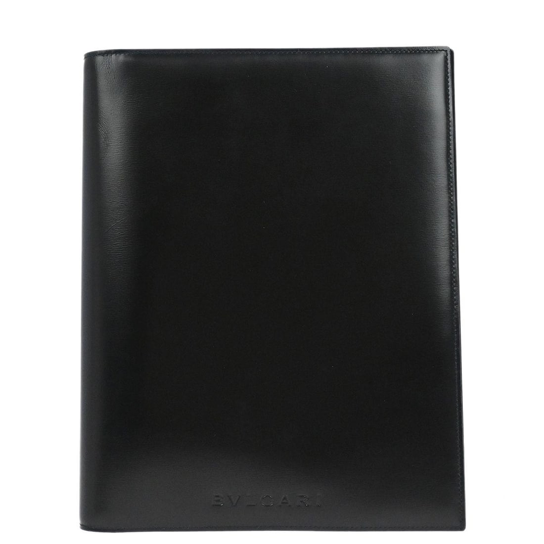 Black Leather Notebook Cover by Bvlgari: Black Leather Notebook Cover by Bvlgari This is a Bvlgari notebook cover crafted from black leather. Made in Italy, it features a sleek design and is in very good condition both inside and out. Specif