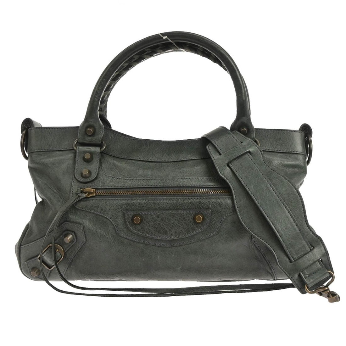 Balenciaga First Dark Green Lambskin Convertible Top Handle Bag 103208.1202: Balenciaga First Dark Green Lambskin Convertible Top Handle Bag 103208.1202 This Balenciaga The First 2-way handbag is crafted from dark green leather and features double handles, inner pockets, and a