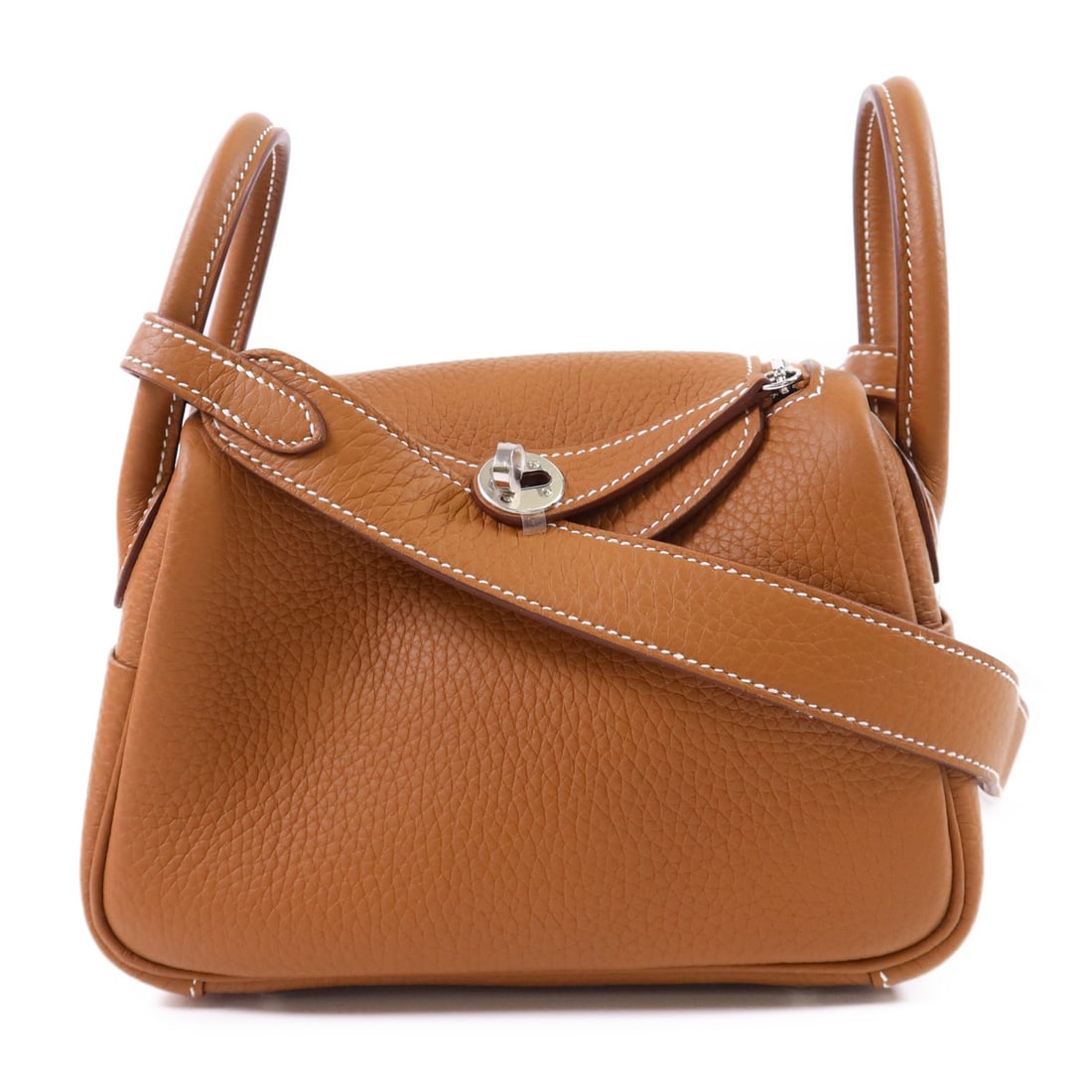 Mini Lindy Brown Clemence Leather Shoulder Bag with Palladium Hardware by Hermes: Mini Lindy Brown Clemence Leather Shoulder Bag with Palladium Hardware by Hermes This Hermes Mini Lindy 2-way shoulder bag is crafted from Clemence leather in a rich brown color. Featuring a versatile
