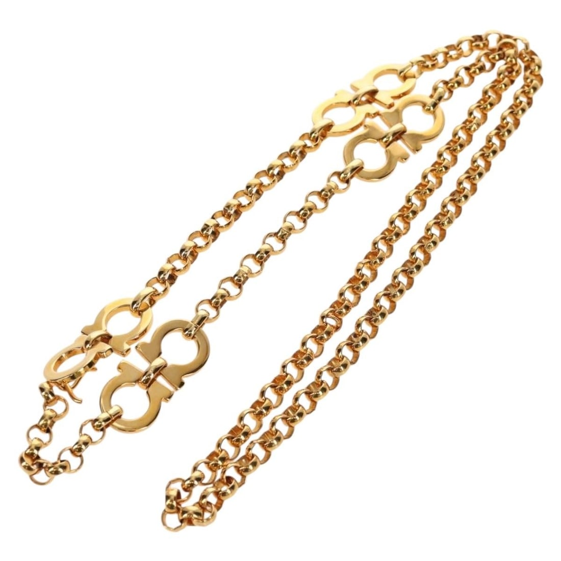 Salvatore Ferragamo Gold Metal Gancini Chain Belt Authentic: Salvatore Ferragamo Gold Metal Gancini Chain Belt Authentic Elevate your style with this authentic Salvatore Ferragamo Gancini Chain Belt. Crafted in Italy, this stunning belt features a sleek gold me