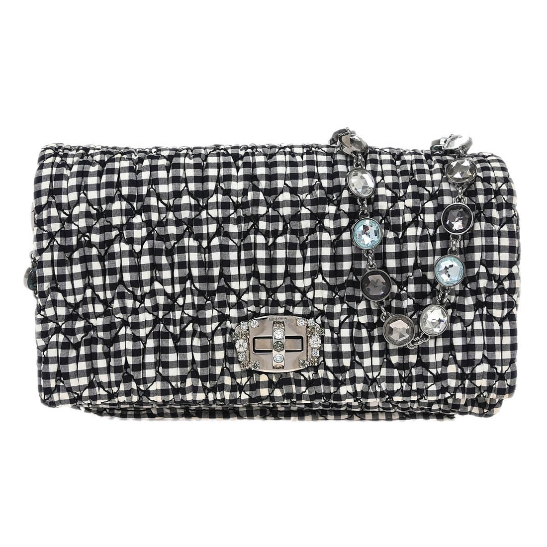 Miu Miu Matelasse Canvas Crystal Clutch in Gingham Print: Miu Miu Matelasse Canvas Crystal Clutch in Gingham Print This Miu Miu Crystal Clutch is crafted from black canvas featuring a matelasse gingham print. Designed for women, it includes a bijou chain sho