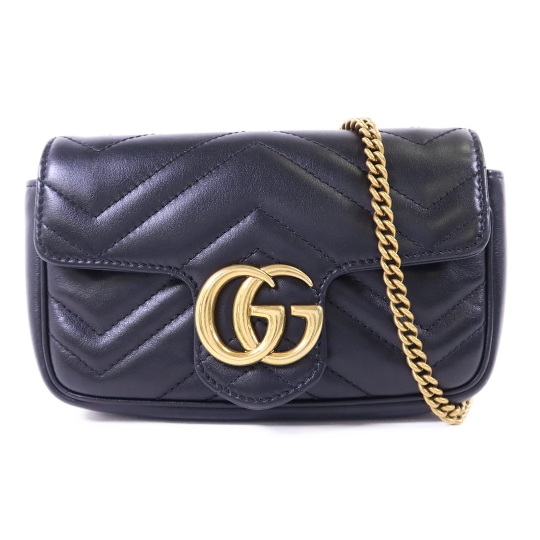 Black Calfskin GG Marmont Super Mini Chain Shoulder Bag by Gucci: Black Calfskin GG Marmont Super Mini Chain Shoulder Bag by Gucci This Gucci GG Marmont Super Mini chain shoulder bag features luxurious black calfskin leather with gold-tone hardware. Crafted in Italy