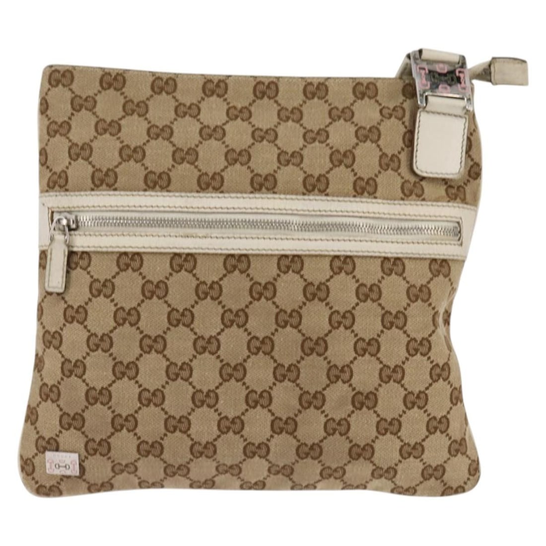 Gucci Beige Canvas Flat Messenger Bag for Women: Gucci Beige Canvas Flat Messenger Bag for Women This Gucci Flat Messenger Bag is crafted from beige canvas and designed for women. It features a spacious design suitable for daily use. The bag is pre-
