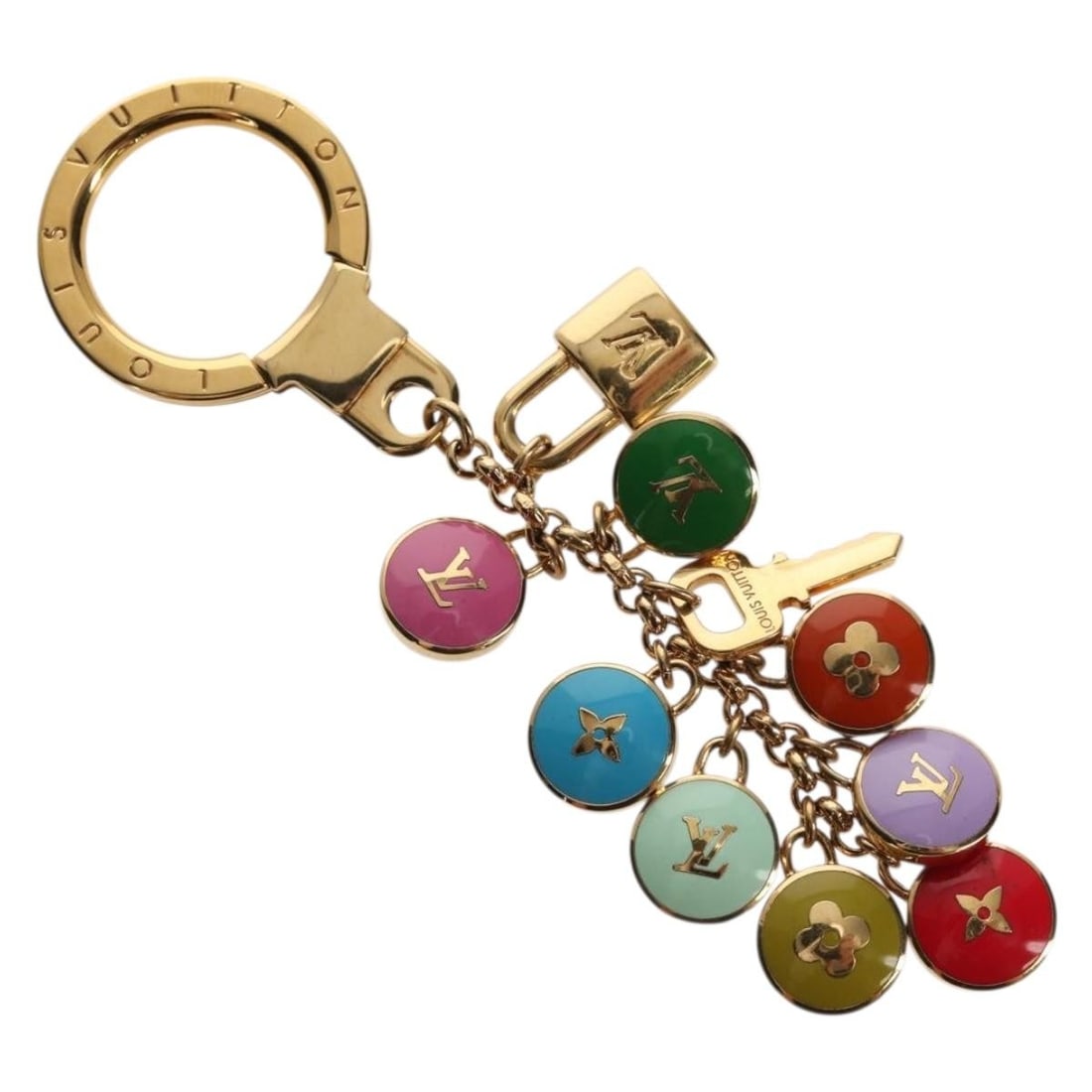 LOUIS VUITTON M65381 Gold Metal Key Holder with Dust Bag: LOUIS VUITTON M65381 Gold Metal Key Holder with Dust Bag This Louis Vuitton Porte Cles Chainne Pastille Key Holder is a stylish and functional accessory crafted from high-quality metal in a luxurious