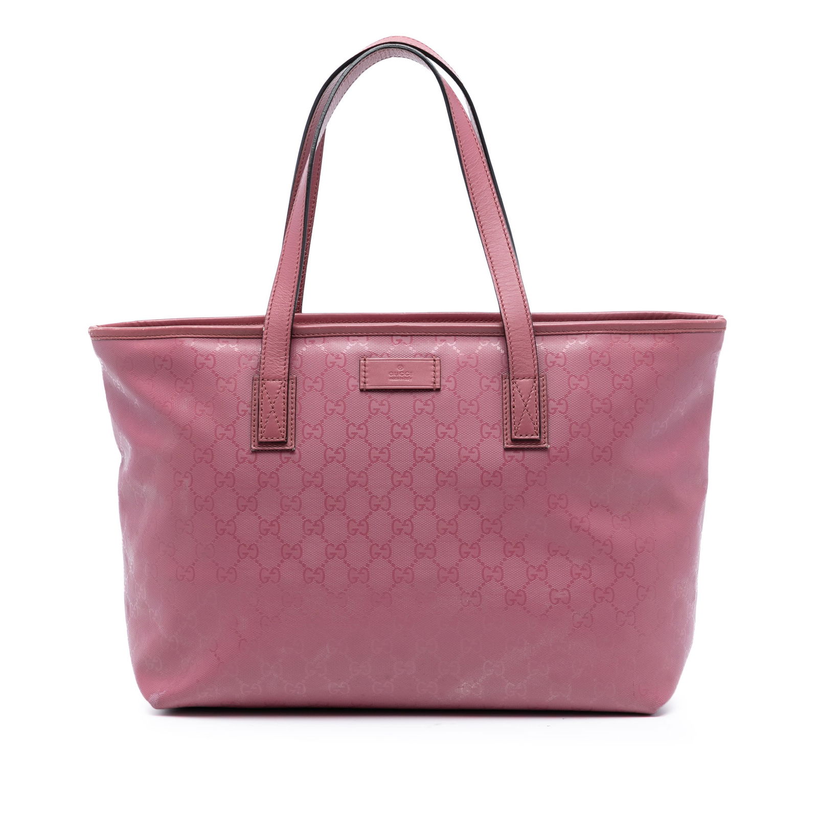 Pink Medium GG Imprime Tote Bag by Gucci in Coated Canvas: Pink Medium GG Imprime Tote Bag by Gucci in Coated Canvas This Gucci Medium GG Imprime Tote features a coated canvas body with leather trim, flat leather handles, a top zip closure, and an interior zi