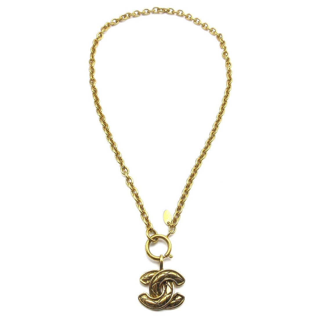 Chanel Gold-Plated CC Pendant Necklace Charm 3857: Chanel Gold-Plated CC Pendant Necklace Charm 3857 Elevate your accessory collection with this stunning Chanel Quilted CC Pendant Necklace. This elegant piece showcases a charming CC pendant shape, bea