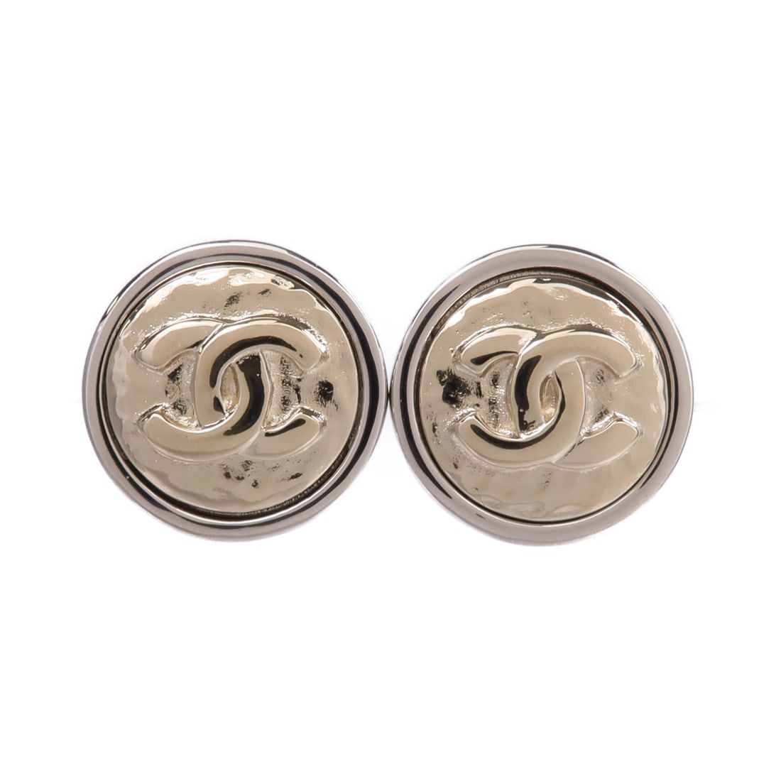 Gold Tone Pierced Earrings by CHANEL with CC Logo: Gold Tone Pierced Earrings by CHANEL with CC Logo These CHANEL CC earrings feature a stylish design crafted from gold-toned metal. Designed as pierced earrings, they do not include any stones and offe