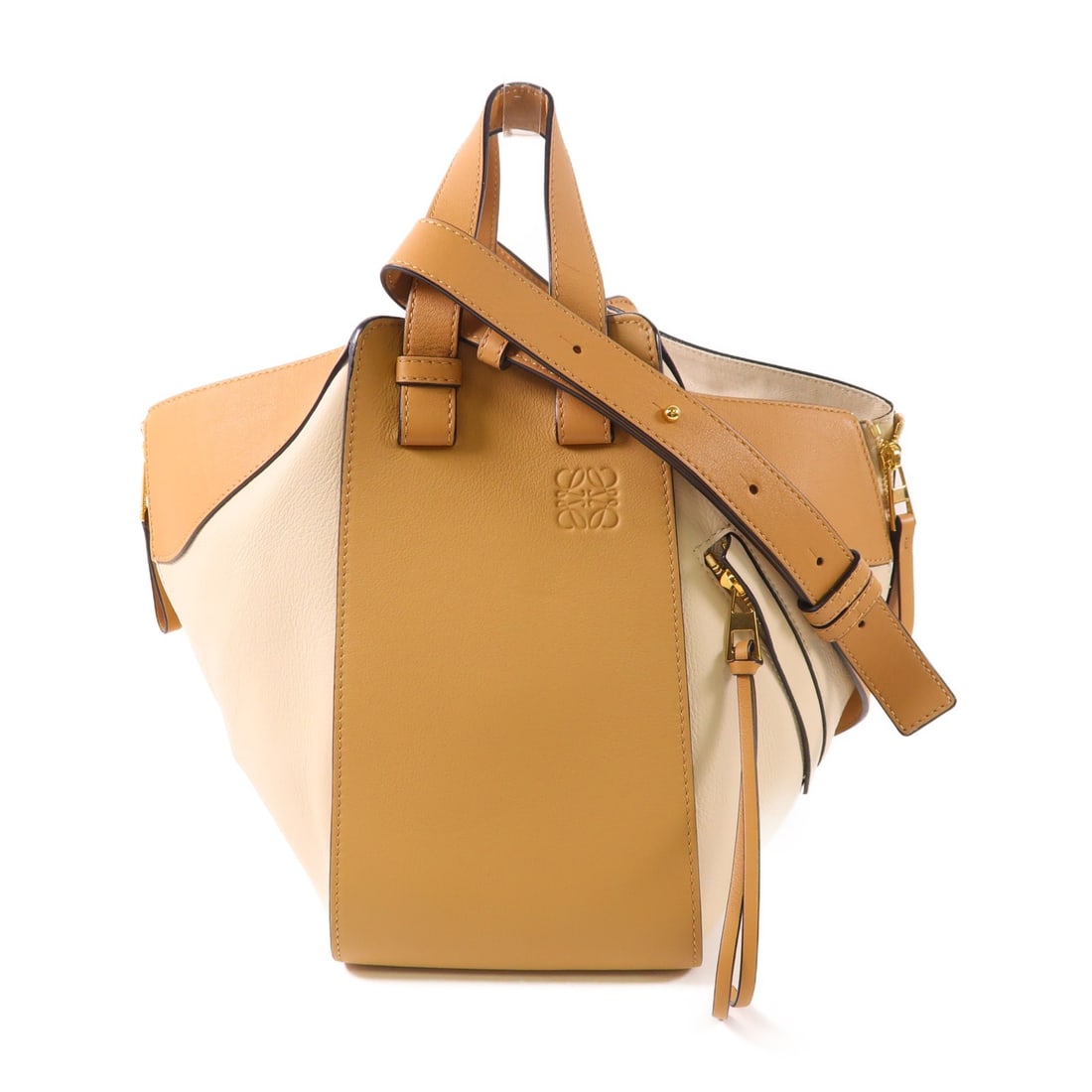 LOEWE Hammock MM 2way Shoulder Bag Beige Calfskin: LOEWE Hammock MM 2way Shoulder Bag Beige Calfskin Introducing the LOEWE Hammock MM 2way Shoulder Bag, a sophisticated accessory crafted from high-quality calfskin (cowhide) in a stylish beige color. T