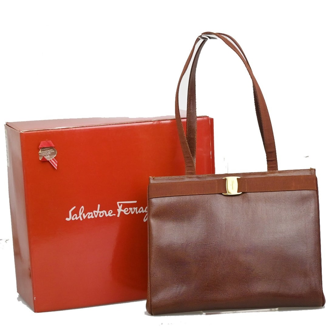 Leather Brown Salvatore Ferragamo Vara Shoulder Purse: Leather Brown Salvatore Ferragamo Vara Shoulder Purse This Salvatore Ferragamo Vara shoulder bag for women features brown leather construction with a classic design. It measures 34cm x 26cm x 13cm and