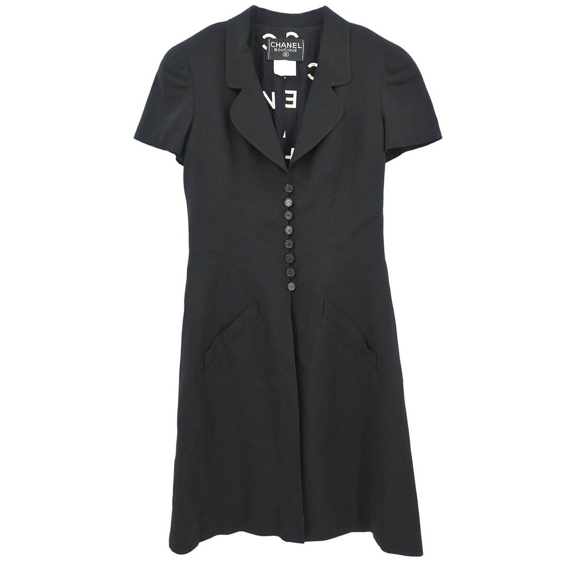 Chanel Black Wool T-Shirt Dress #38 Casual 97P: Chanel Black Wool T-Shirt Dress #38 Casual 97P Elevate your wardrobe with this stunning Chanel Jacket Dress in classic black. Designed for versatility, this T-shirt dress features a collared neckline