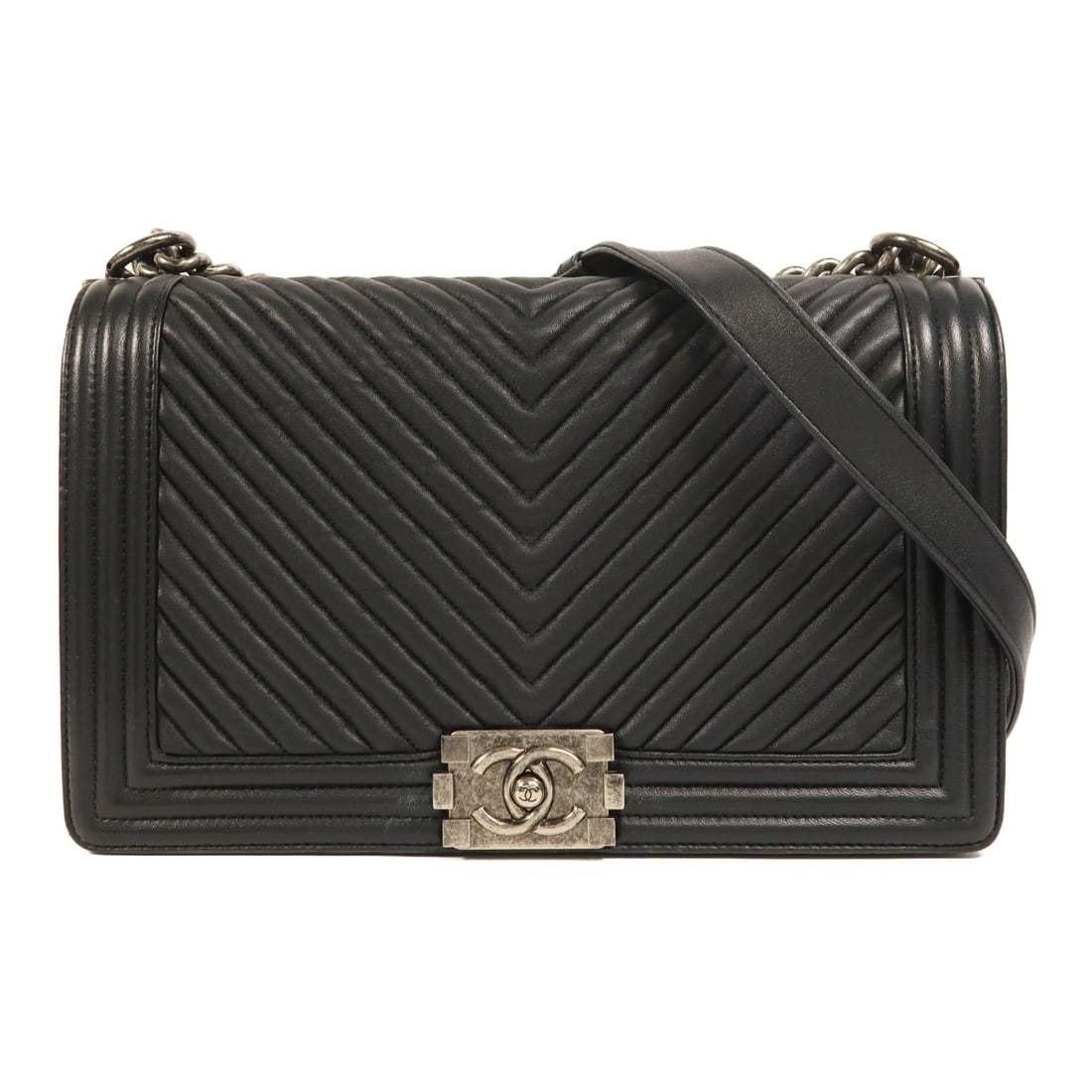 Chanel Boy 28 Black Calfskin Leather Chain Shoulder Bag with Silver Hardware: Chanel Boy 28 Black Calfskin Leather Chain Shoulder Bag with Silver Hardware This Chanel Boy 28 chain shoulder bag is crafted from black calfskin leather and features silver-tone hardware. Made in Fra