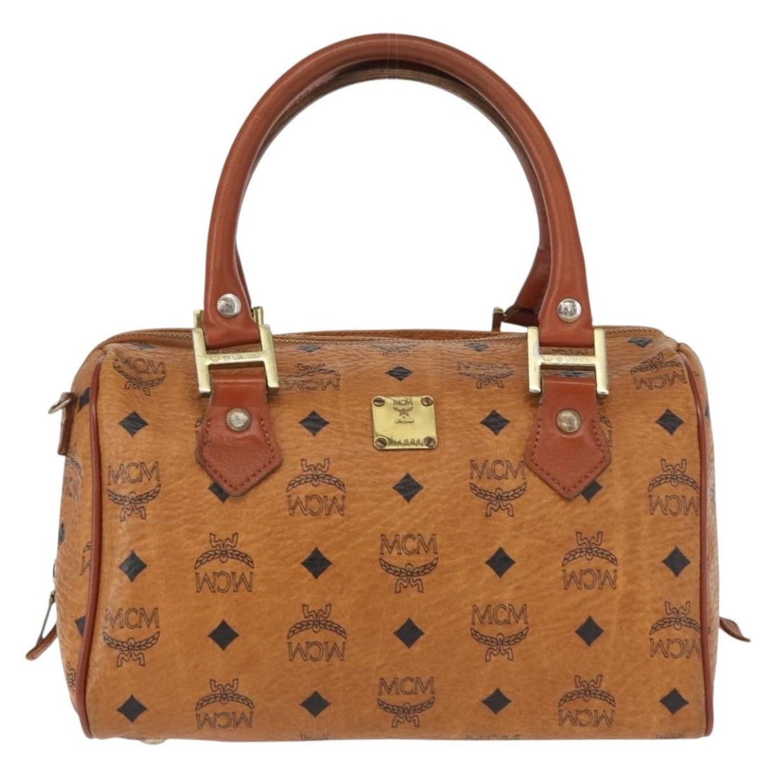 Visetos Logogramme Brown Canvas Leather Handbag by MCM: Visetos Logogramme Brown Canvas Leather Handbag by MCM This MCM Visetos Logogramme handbag is crafted from durable canvas with leather accents in a classic brown color. Designed for women, it
