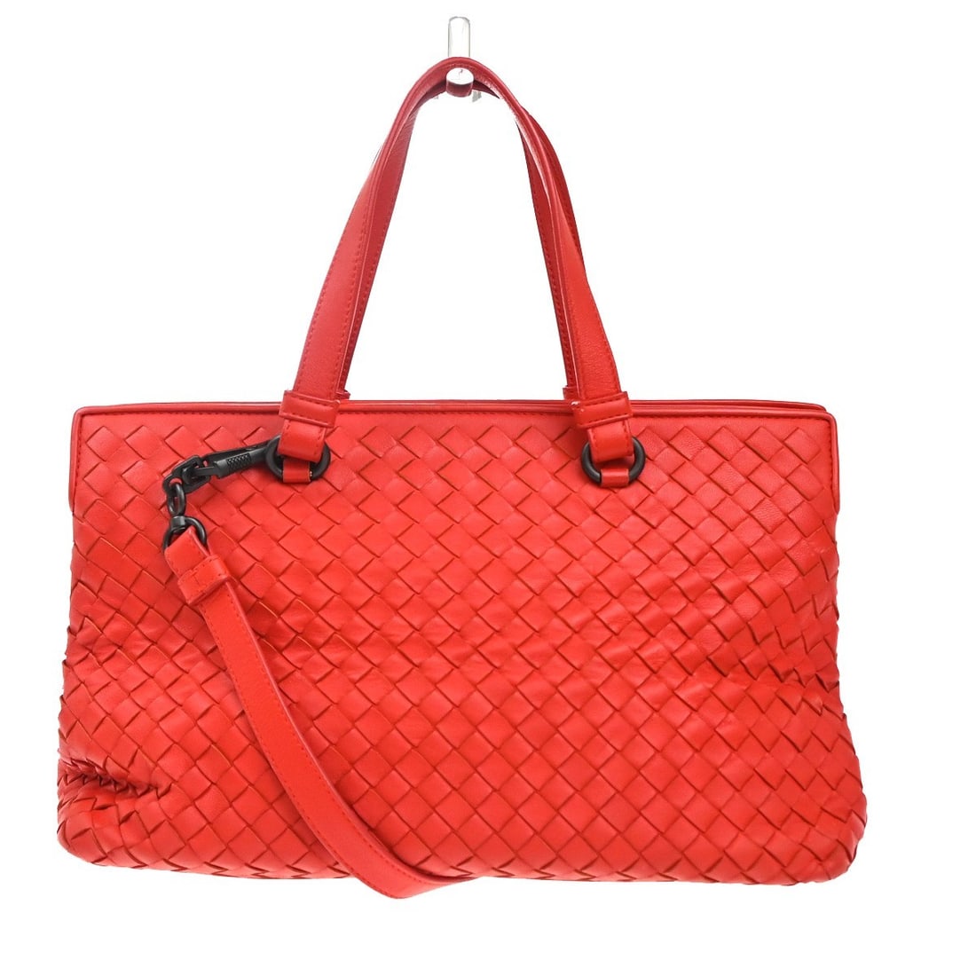 Red Intrecciato Nappa Leather 2-Pocket Convertible Tote by Bottega Veneta: Red Intrecciato Nappa Leather 2-Pocket Convertible Tote by Bottega Veneta This Bottega Veneta 2-Pocket Convertible Tote features the iconic Intrecciato nappa leather in a bold red color. Designed for