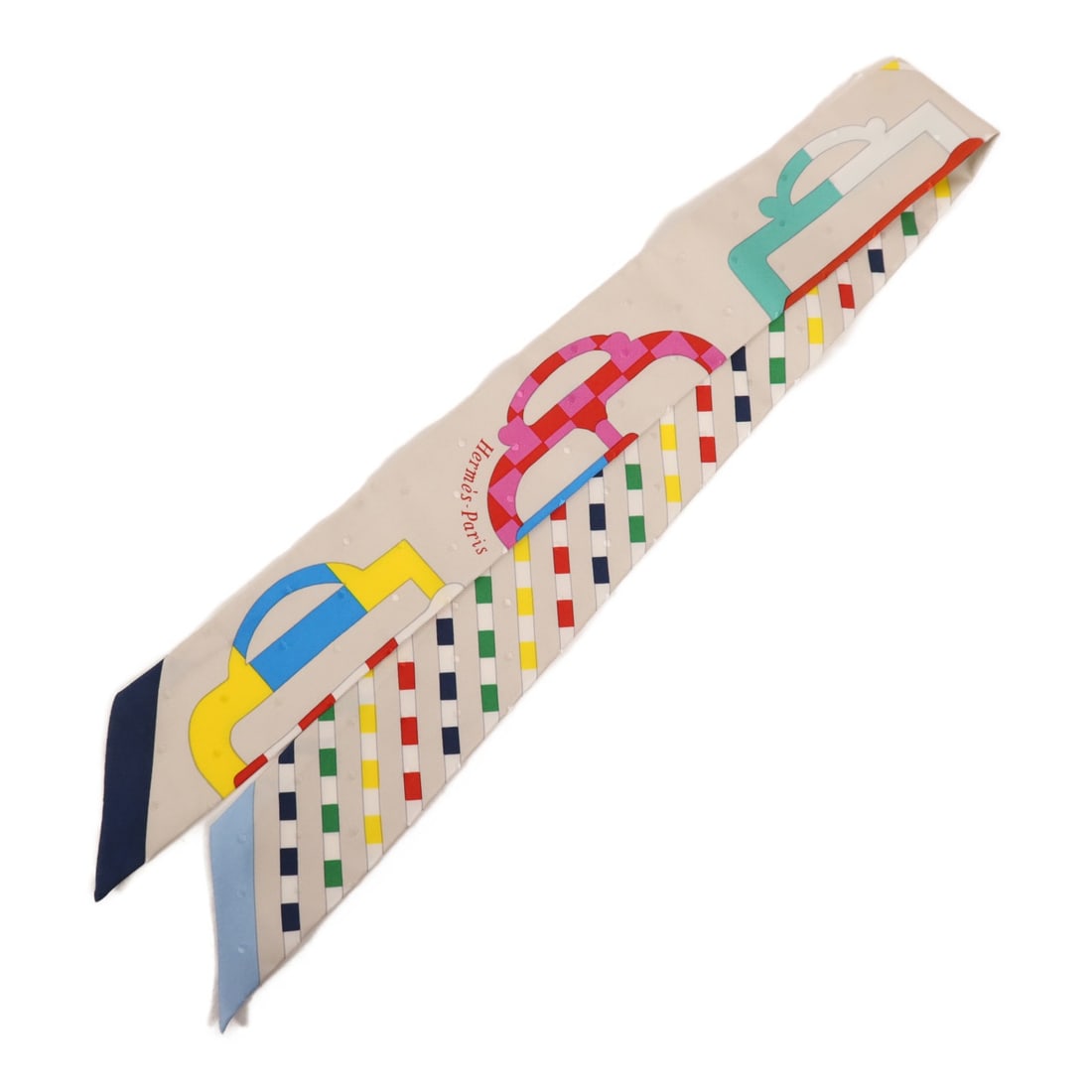 HERMES Twilly Gray Multicolor Silk Scarf Made in France: HERMES Twilly Gray Multicolor Silk Scarf Made in France This exquisite HERMES Twilly scarf is crafted from 100% silk, showcasing a stunning gray and multicolor design. Perfect for adding a touch of el